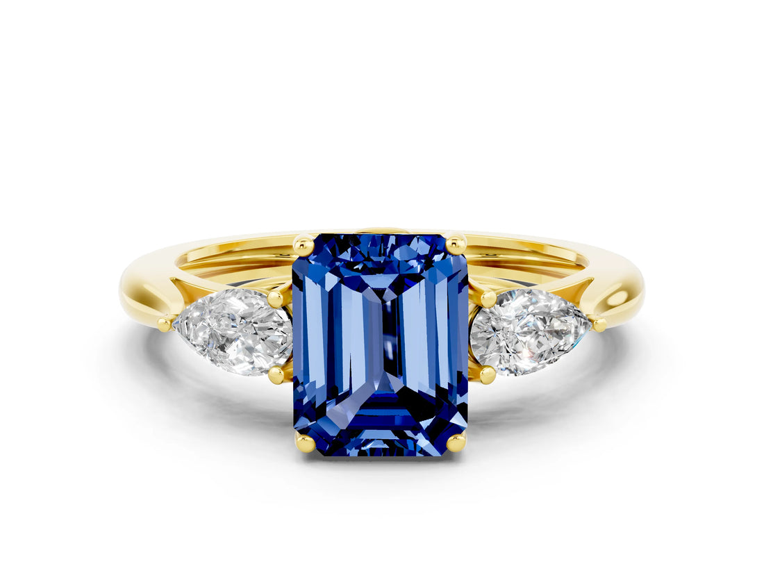 Yellow gold Three-Stone Emerald Cut Blue Sapphire Ring with Pear  Side Stones in Four-Prong Setting_12
