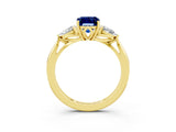 Yellow gold Three-Stone Emerald Cut Blue Sapphire Ring with Pear  Side Stones in Four-Prong Setting_15