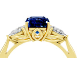 Yellow gold Three-Stone Emerald Cut Blue Sapphire Ring with Pear  Side Stones in Four-Prong Setting_16