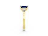 Yellow gold Three-Stone Emerald Cut Blue Sapphire Ring with Pear  Side Stones in Four-Prong Setting_38