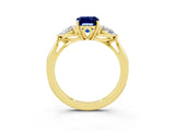 Yellow gold Three-Stone Emerald Cut Blue Sapphire Ring with Pear  Side Stones in Four-Prong Setting_39