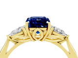 Yellow gold Three-Stone Emerald Cut Blue Sapphire Ring with Pear  Side Stones in Four-Prong Setting_40