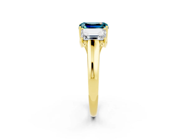 Yellow gold Three-Stone Emerald Cut Blue Topaz Engagement Ring with Prong Setting