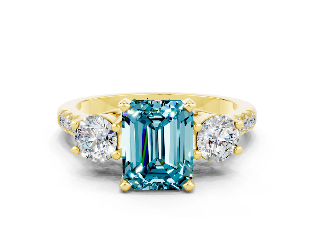 Yellow gold Three-Stone Emerald Cut Blue Topaz Pavé Band with Four-Prong Setting