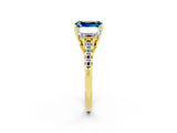 Yellow gold Three-Stone Emerald Cut Blue Topaz Ring with Pavé Band and Prong Setting_14