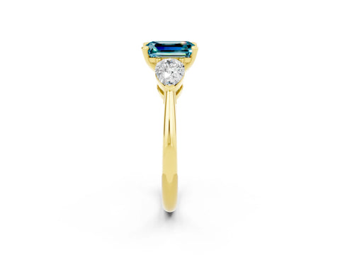 Yellow gold Three-Stone Emerald Cut Blue Topaz Ring with Pear Side Stones and Four-Prong Setting_2