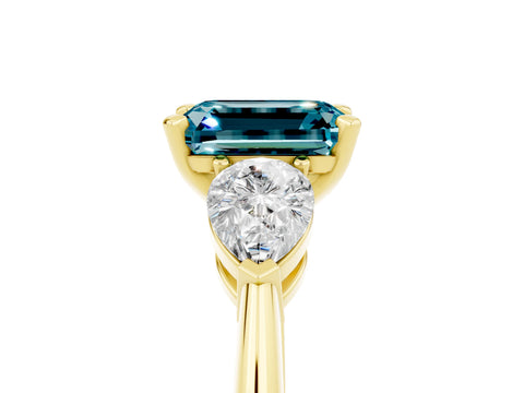 Yellow gold Three-Stone Emerald Cut Blue Topaz Ring with Pear Side Stones and Four-Prong Setting_5