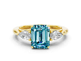 Yellow gold Three-Stone Emerald Cut Blue Topaz Ring with Pear  Side Stones in Four-Prong Setting_12