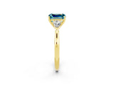 Yellow gold Three-Stone Emerald Cut Blue Topaz Ring with Pear  Side Stones in Four-Prong Setting_14