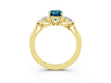 Yellow gold Three-Stone Emerald Cut Blue Topaz Ring with Pear  Side Stones in Four-Prong Setting_15