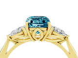 Yellow gold Three-Stone Emerald Cut Blue Topaz Ring with Pear  Side Stones in Four-Prong Setting_16