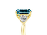 Yellow gold Three-Stone Emerald Cut Blue Topaz Ring with Pear  Side Stones in Four-Prong Setting_17