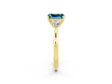 Yellow gold Three-Stone Emerald Cut Blue Topaz Ring with Pear  Side Stones in Four-Prong Setting_38