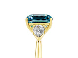 Yellow gold Three-Stone Emerald Cut Blue Topaz Ring with Pear  Side Stones in Four-Prong Setting_41