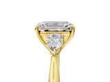 Yellow gold Three-Stone Emerald Cut Brilliant Diamond Solitaire Ring with Tapered Band and Four-Prong Setting_17