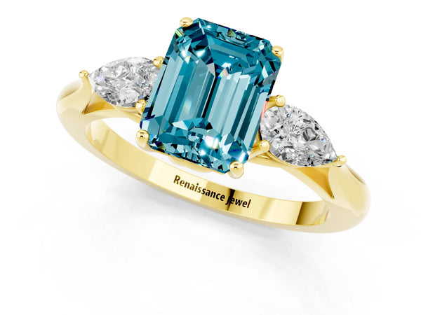Yellow gold Three-Stone Emerald Cut Cut Diamond Ring with Pear Side Stones in Four-Prong Setting