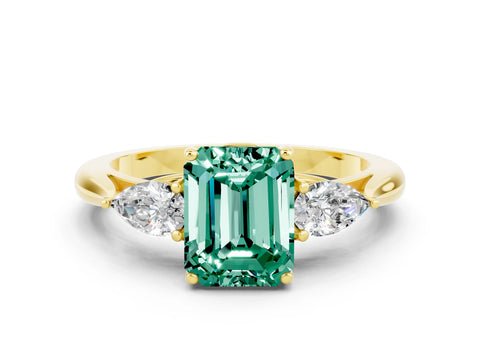 Yellow gold Three-Stone Emerald Cut Cut Diamond Ring with Pear Side Stones in Four-Prong Setting