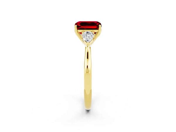 Yellow gold Three-Stone Emerald Cut Cut Diamond Ring with Pear Side Stones in Four-Prong Setting