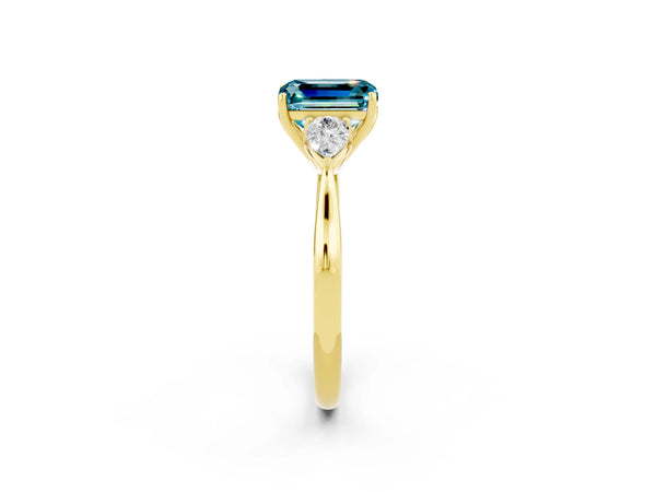 Yellow gold Three-Stone Emerald Cut Cut Diamond Ring with Pear Side Stones in Four-Prong Setting