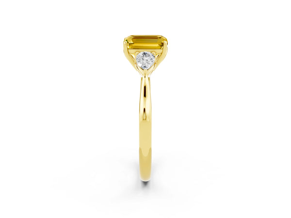 Yellow gold Three-Stone Emerald Cut Yellow Sapphire Ring with Pear  Side Stones in Four-Prong Setting
