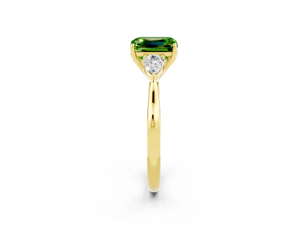 Yellow gold Three-Stone Emerald Cut Cut Diamond Ring with Pear Side Stones in Four-Prong Setting