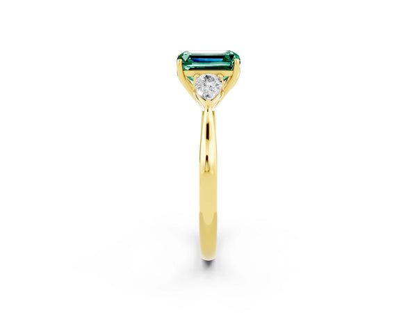 Yellow gold Three-Stone Emerald Cut Green Sapphire Ring with Pear  Side Stones in Four-Prong Setting