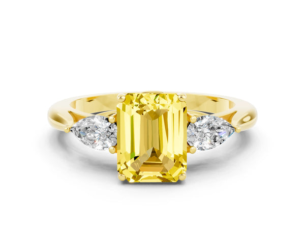 Yellow gold Three-Stone Emerald Cut Yellow Sapphire Ring with Pear  Side Stones in Four-Prong Setting