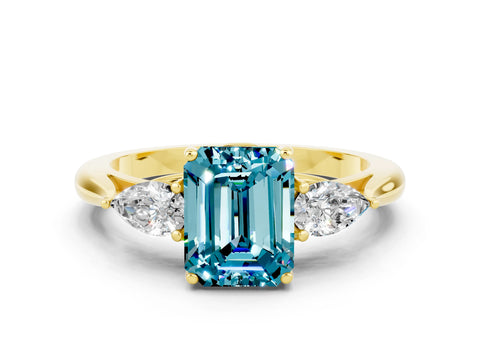 Yellow gold Three-Stone Emerald Cut Cut Diamond Ring with Pear Side Stones in Four-Prong Setting