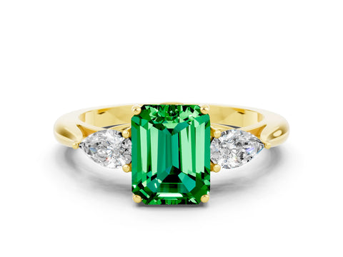 Yellow gold Three-Stone Emerald Cut Cut Diamond Ring with Pear Side Stones in Four-Prong Setting