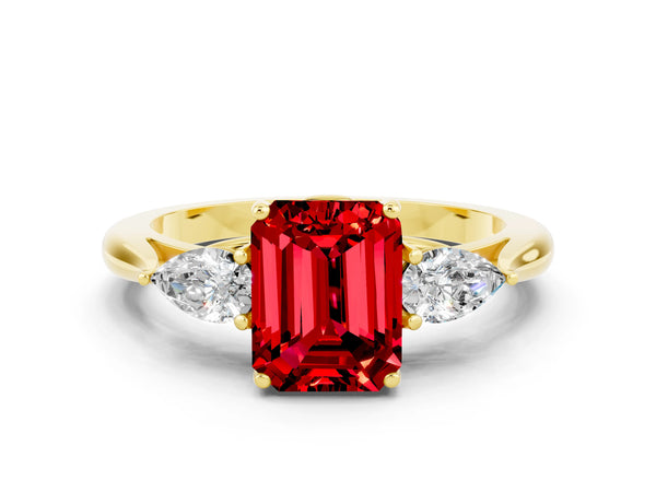Yellow gold Three-Stone Emerald Cut Cut Diamond Ring with Pear Side Stones in Four-Prong Setting