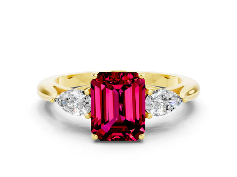 Yellow gold Three-Stone Emerald Cut Cut Diamond Ring with Pear Side Stones in Four-Prong Setting