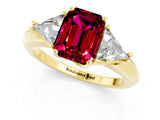 Yellow gold Three-Stone Emerald Cut Cut Diamond Ring with Trillion Side Stones and Four-Prong Setting_1