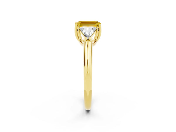 Yellow gold Three-Stone Emerald Cut Yellow Sapphire Engagement Ring with Trillion Side Stones and Prong Setting