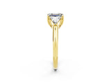 Yellow gold Three-Stone Emerald Cut Cut Diamond Ring with Trillion Side Stones and Four-Prong Setting_2