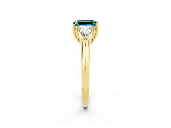 Yellow gold Three-Stone Emerald Cut Cut Diamond Ring with Trillion Side Stones and Four-Prong Setting