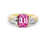 Yellow gold Three-Stone Emerald Cut Cut Diamond Ring with Trillion Side Stones and Four-Prong Setting