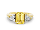 Yellow gold Three-Stone Emerald Cut Cut Diamond Ring with Trillion Side Stones and Four-Prong Setting
