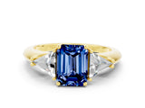 Yellow gold Three-Stone Emerald Cut Cut Diamond Ring with Trillion Side Stones and Four-Prong Setting