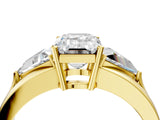 Yellow gold Three-Stone Emerald Cut Cut Diamond Ring with Trillion Side Stones on a Split Shank Band_13
