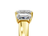 Yellow gold Three-Stone Emerald Cut Diamond Ring with Channel Set Band and Four-Prong Setting_34