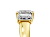 Yellow gold Three-Stone Emerald Cut Diamond Ring with Channel Set Band and Four-Prong Setting_46