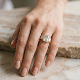 Yellow gold Three-Stone Emerald Cut Diamond Ring with Channel Set Band and Four-Prong Setting_6