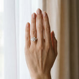 Yellow gold Three-Stone Emerald Cut Diamond Ring with Pear Side Stones and Four-Prong Setting_13