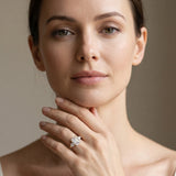 Yellow gold Three-Stone Emerald Cut Diamond Ring with Pear Side Stones and Four-Prong Setting_14