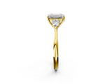 Yellow gold Three-Stone Emerald Cut Diamond Ring with Pear Side Stones in Four-Prong Setting_176