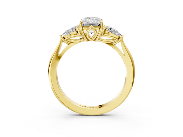Yellow gold Three-Stone Emerald Cut Diamond Ring with Pear Side Stones in Four-Prong Setting
