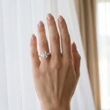 Yellow gold Three-Stone Emerald Cut Diamond Ring with Pear Side Stones in Four-Prong Setting_191