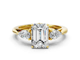 Yellow gold Three-Stone Emerald Cut Diamond Ring with Pear  Side Stones in Four-Prong Setting_20