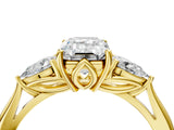 Yellow gold Three-Stone Emerald Cut Diamond Ring with Pear  Side Stones in Four-Prong Setting_30