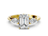 Yellow gold Three-Stone Emerald Cut Diamond Ring with Pear  Side Stones in Four-Prong Setting_56